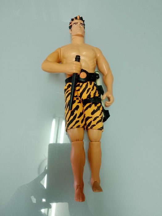 Moto e boneco antigos mas como novos