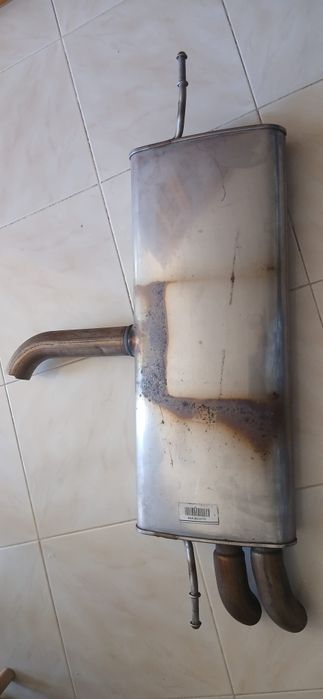 Panela de escape traseira