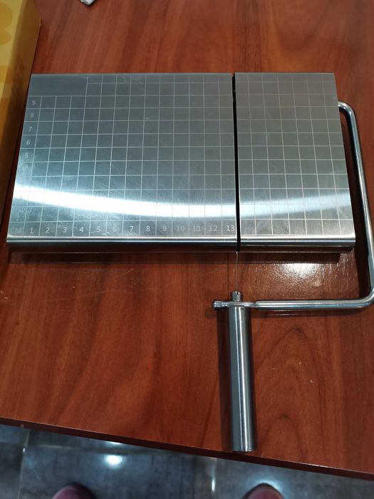 Máquina de cortar queijos