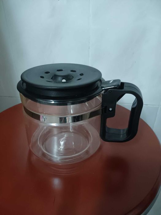 Máquina de café mais copo