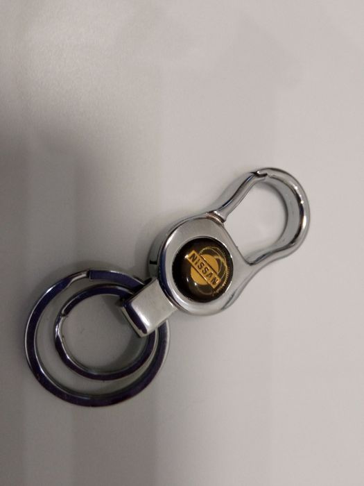 Брелоки для авто ключів металевий Nissan, срібний Шевроле