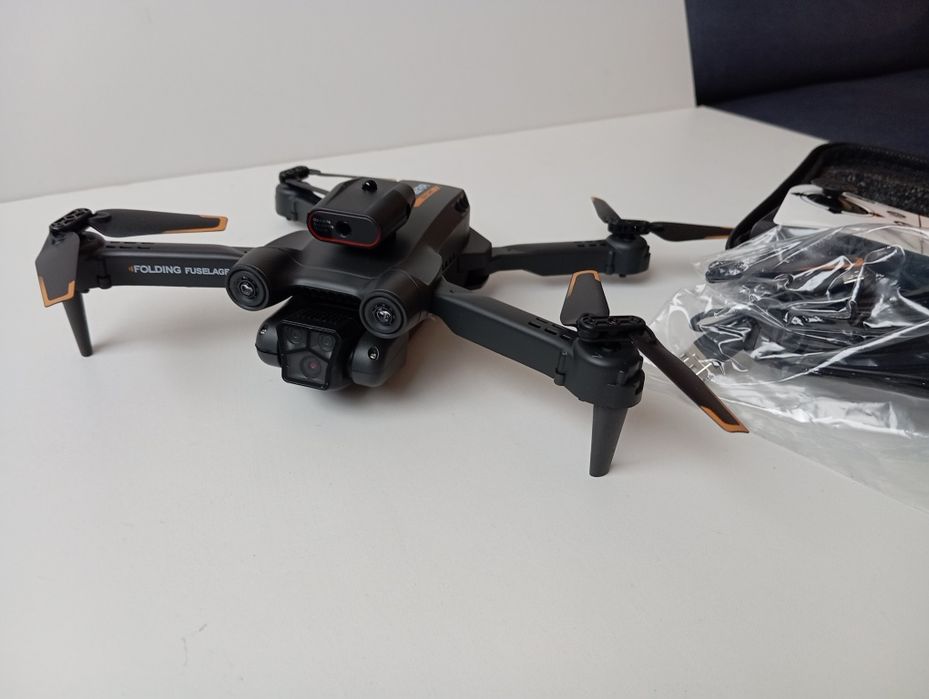 Nowy dron model M17 czujnik  ruchu 30 min lotu 

gwarancja na wszystki