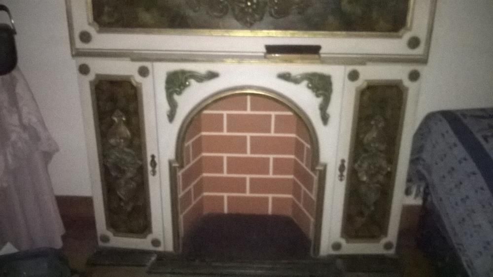 Vintage fireplace with marble top