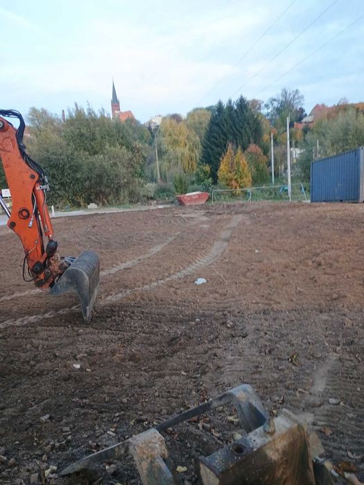 Usługi koparko ładowarką mecalac 12