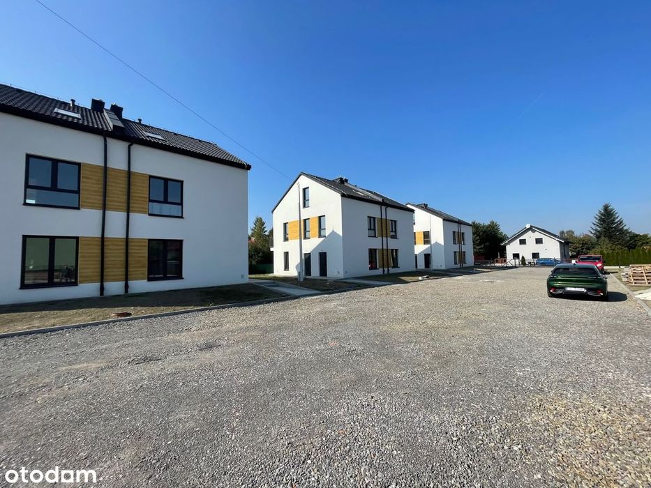 Dwupoziomowe mieszkanie z ogrodkiem i balkonem