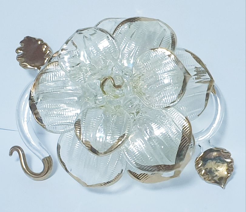 Exquisite antique flower in iridescent and golden artistic glass