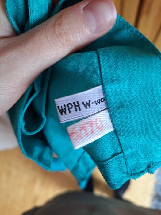 Zielony fartuch anatomiczny medyczny