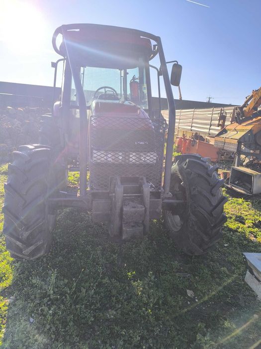 Trator de rodas Case IH JX 95 + Triturador Rousseau Velthéa