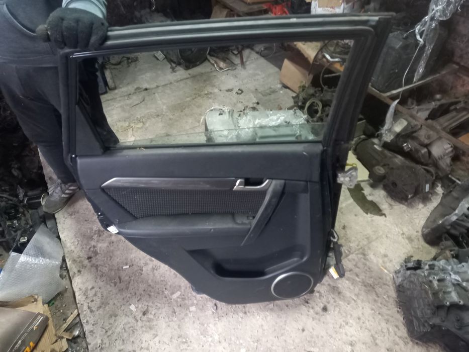 Двері Шевроле каптіва с100