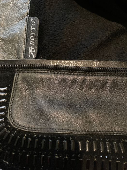 Зимові ботфорти на каблуку