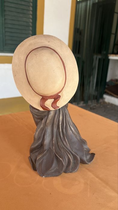 Boneca em cerâmica