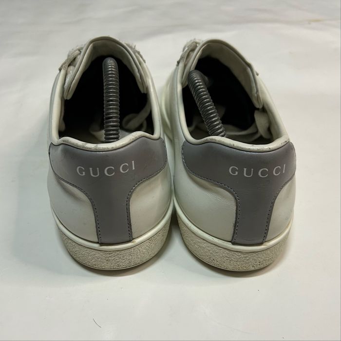 Białe skórzane sneakersy Gucci Ace Interlocking G