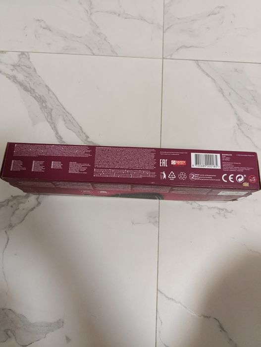 Щітка-випрямляч для волосся Philips 5000
серії 5000