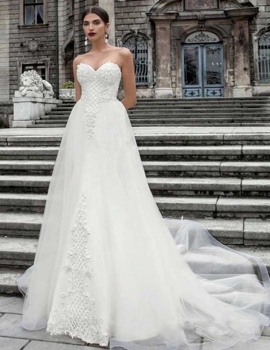 Suknia slubna z trenem dopinanym