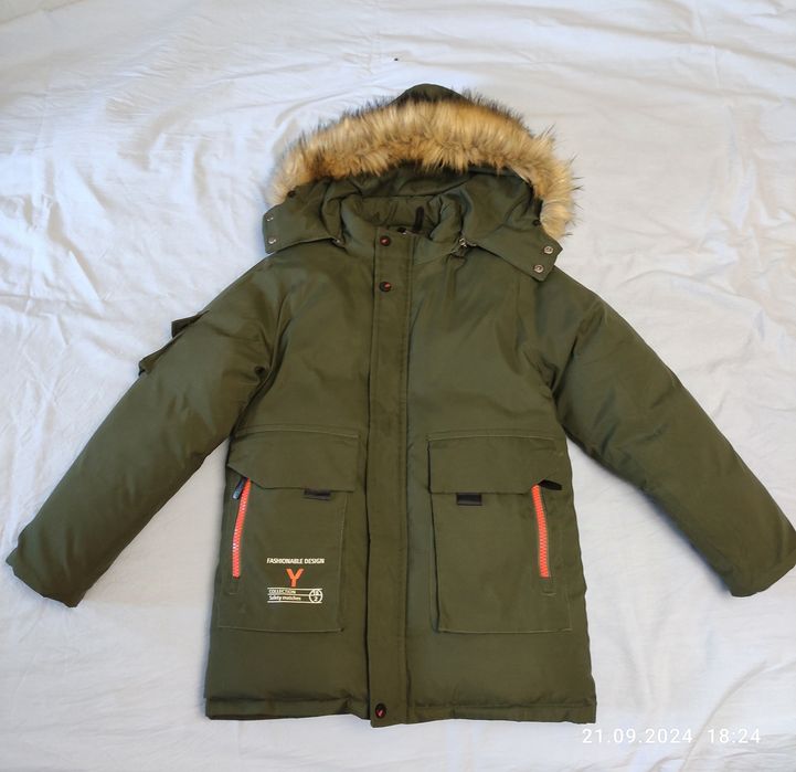 Куртка зимняя на мальчика 12-13 лет.