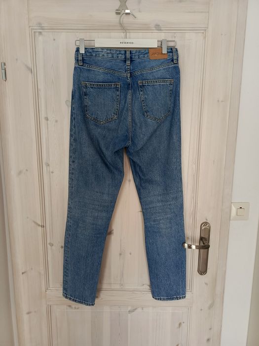 Jeansowe dżinsowe spodnie mom fit niebieskie Monki 36 S