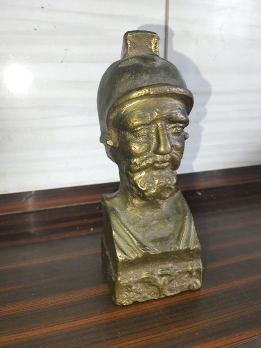 Busto de bronze antigo