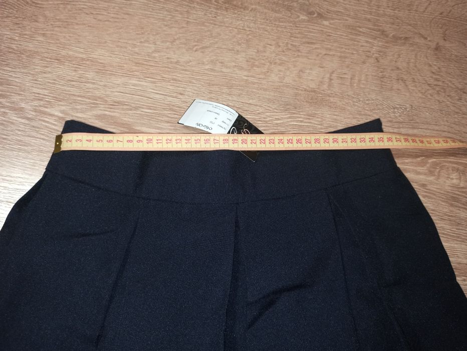 Продам новую юбку (спідниця) в складку темно-синього кольору р.48