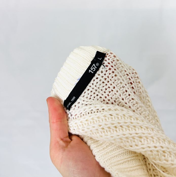 Biały sweter w czarne pasy o luźnym splocie L 40