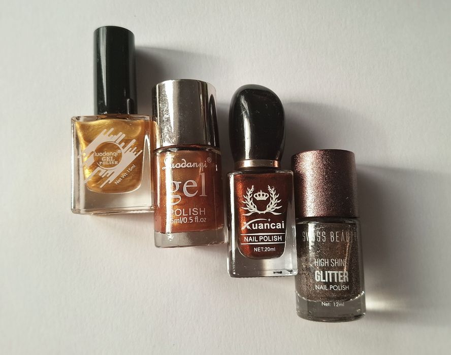 Zestaw lakierów do paznokci metaliczno brokatowych złote brązy