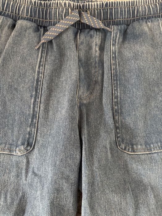 Joggersy H&M dla chłopca niebieski dżins 140 cm