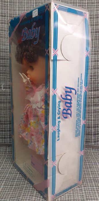 Boneca nova em caixa