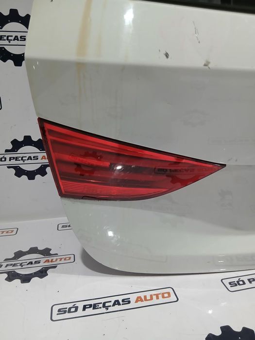 FAROLIM ESQUERDO BRANCO BMW X1 2.0D E84 ANO: 2010