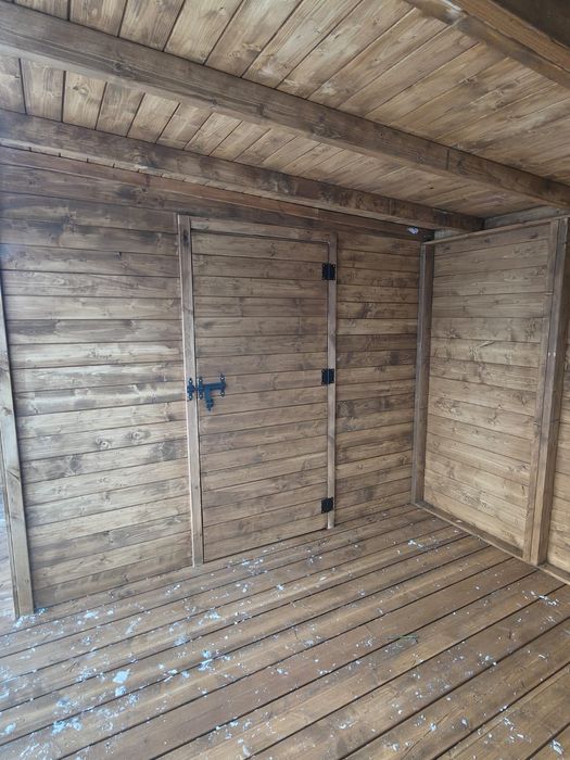 Domek ogrodowy z altaną i pergolami