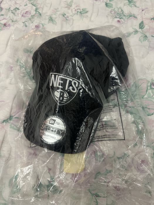 Кепка или бейсболка фирмы new era.NETS.