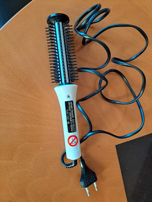 	Escova eléctrica de cabelo