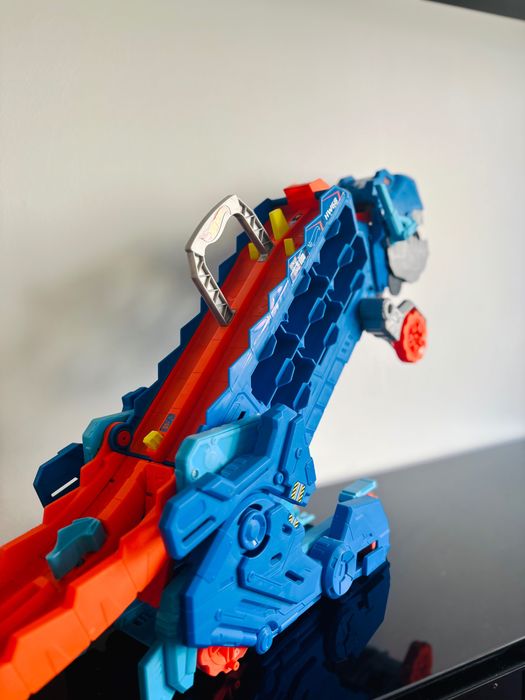 Hot Wheels T-Rex Transportador Gigante – Dinossauro com Pista