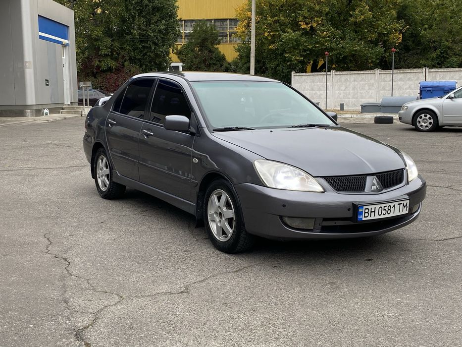 Продам хозяйский Lancer 9