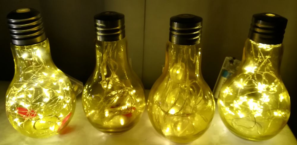 Ofereça de um modo criativo  lâmpadas e/ou garrafas iluminadas