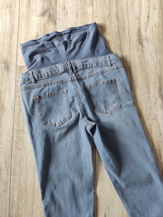 Jeansowe spodnie skinny rurki damskie ciążowe jasny dżins M 38