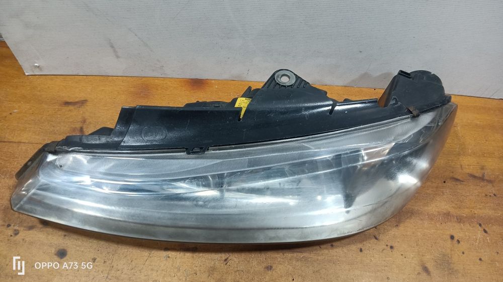 Farol Peugeot 406 ótica 2002 esquerda
