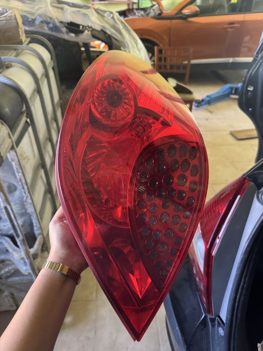 Farolim direito Peugeot 207