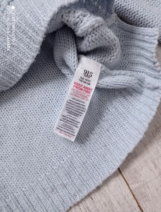 Блакитна жіноча кофтинка м