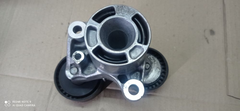 BMW. Натяжитель ремня генератора. 11287810807.