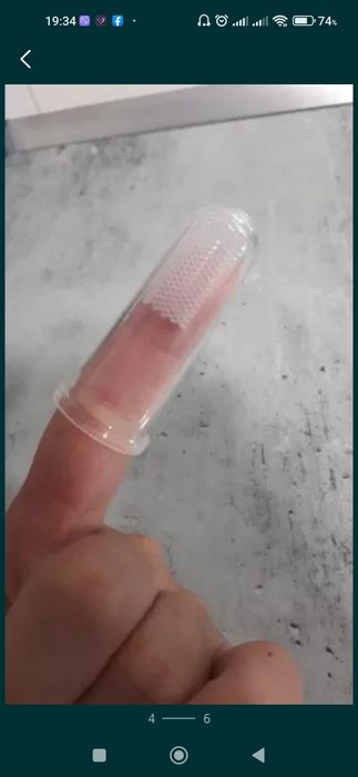 Нова щітка для собак для зубів