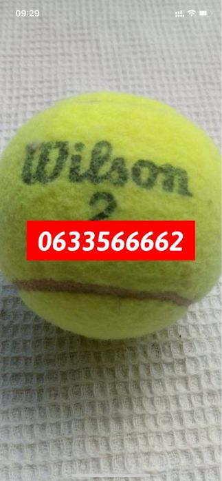Тенісні мячі