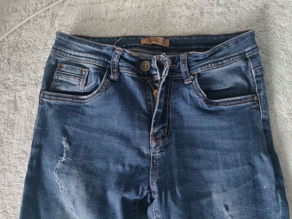 Damskie jeansy 38
