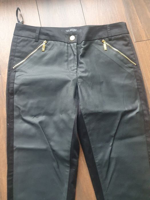 Sprzedam nowe bardzo eleganckie spodnie Top Secret 38