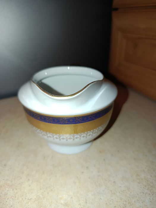 Śliczny stary mlecznik porcelana Karolina