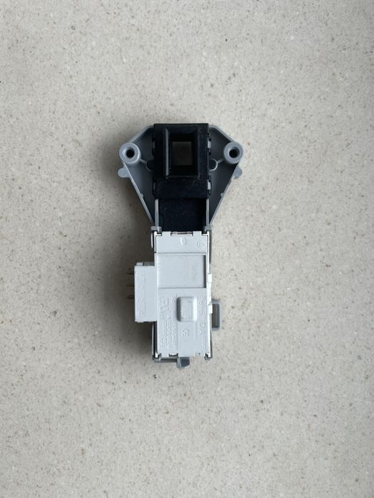 Blokada otwarcia drzwi do pralki LG F10B9LD (DA081043)