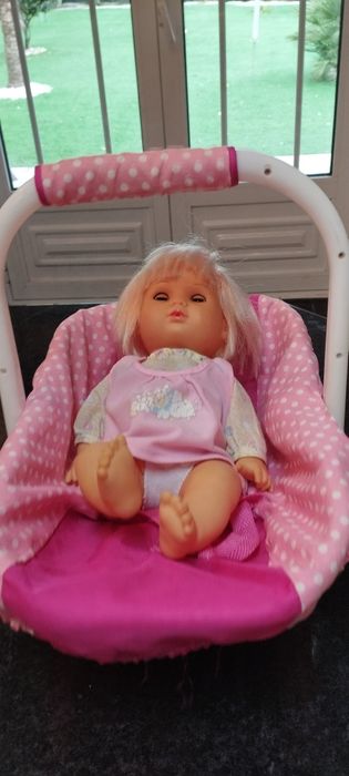 Boneca com alcofa