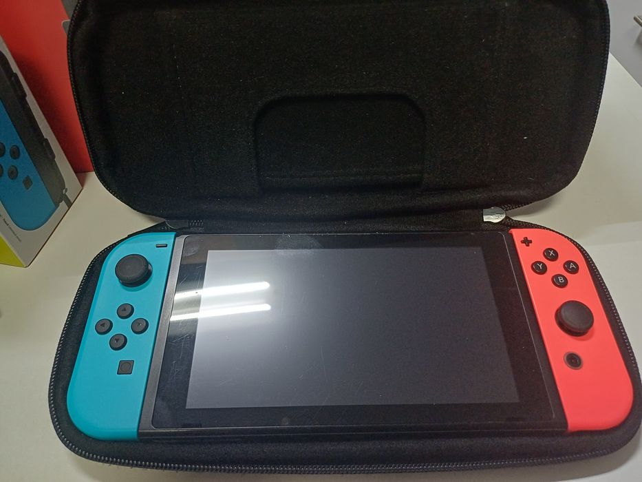 Nintendo + comando extra + bolsa
