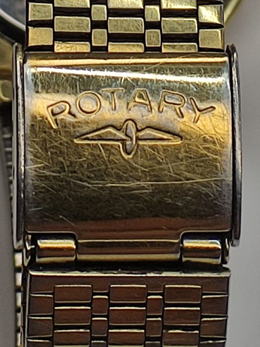 Rotary годинник наручний .позолота.