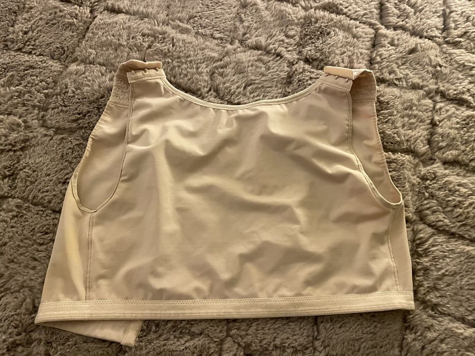 Colete de compressão L