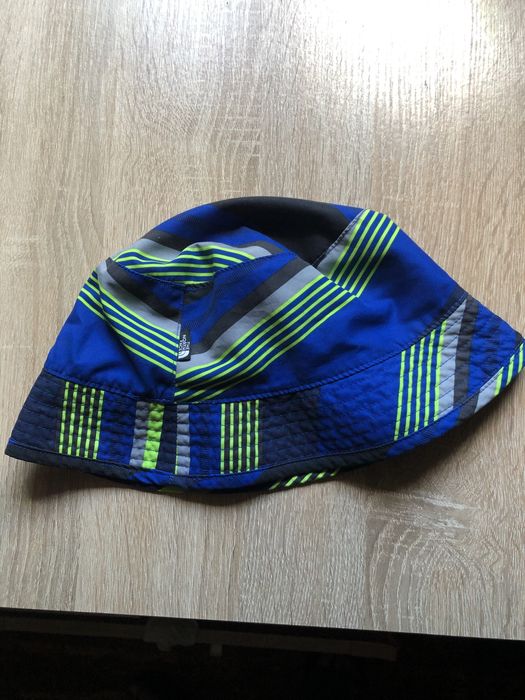 Двухстороння панама від бренду The North Face