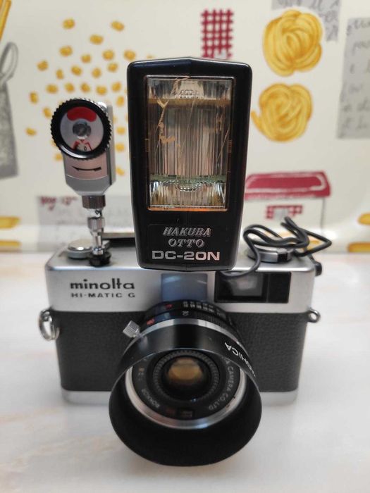 Máquina fotográfica Minolta Hi-Matic G c/ Extras